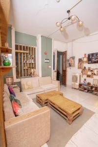 a living room with a couch and a coffee table at Rhala Hostel Egypt in Cairo