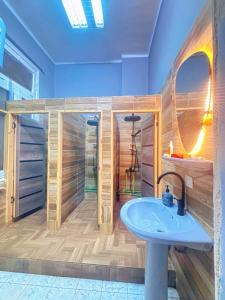 a bathroom with a tub and a sink at Bisan hostel in Cairo