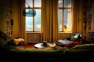 a living room with a couch and a table at DieMosel Minimal in Traben-Trarbach