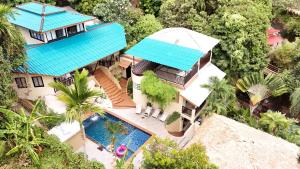 an aerial view of a house with a swimming pool at Little Hill in Haad Rin