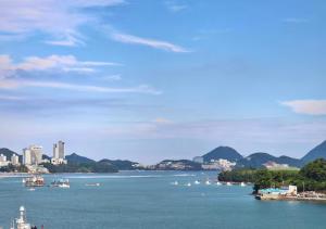 a view of a large body of water with boats in it at Hoya stay in Yeosu