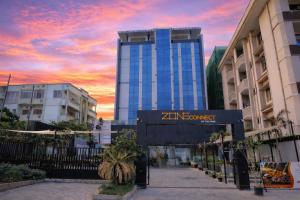 a building with a sign that reads zine connect at Hema's Hotel Supreme in Visakhapatnam