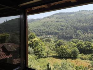 a view from a window of a mountain at Serena Nest 03 in Rio Douro +2 photos
