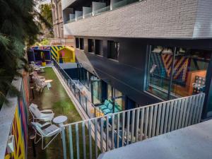 an overhead view of a building with a playground at La 15 Palmera Residence By Soho Boutique in Seville