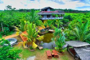 an aerial view of a house in the jungle at Maiya Wild Ship Villa in Kosgoda