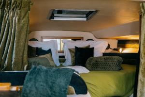a bed in the back of a camper van at SLEEPBOAT YACHT in Oporto Douro in Porto