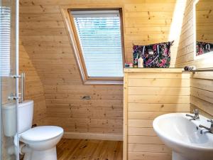 a bathroom with a white toilet and a sink at 1 Bed in Padstow oc-77748 in Padstow +18 photos
