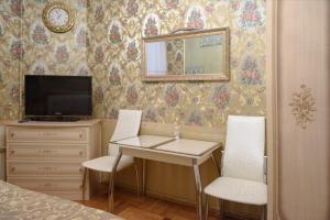 Μια τηλεόραση ή/και κέντρο ψυχαγωγίας στο Apartment Rubinshteyna 15