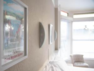 a living room with a picture hanging on the wall at The Tremont in Penzance