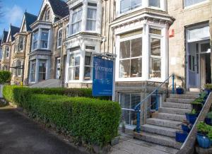 a building with a sign in front of it at The Tremont in Penzance