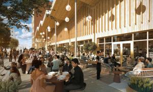 a group of people sitting at tables outside of a building at Le PIC in Clermont-Ferrand