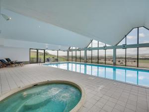 a large swimming pool in a large building at 2 Bed in Forfar oc-92623 in Aberlemno