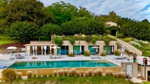 an image of a house with a swimming pool at PECORANERA in Bracciano