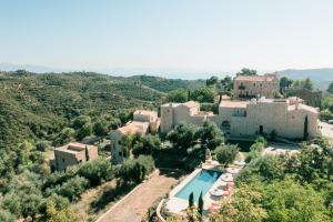 an aerial view of a villa with a swimming pool at Alistos Hotel in Gythio