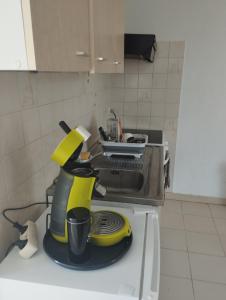 a kitchen with a mixer on top of a counter at L' amandier in Teyran