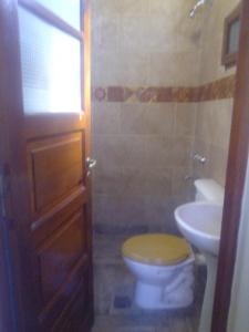 a bathroom with a toilet and a sink at Killa wasy in Humahuaca
