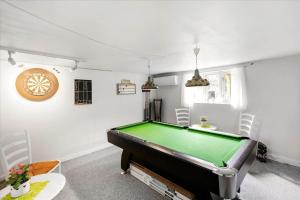 a living room with a pool table in it at 4033-Stege-Kirkebakken-33 in Stege