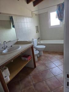a bathroom with a sink and a toilet at Sa Torreta in Algaida +16 photos