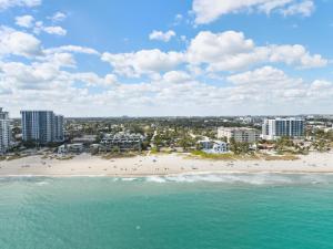 an aerial view of a beach with buildings and the ocean at Bahama Beach Club Pompano - Fort Lauderdale - Charming and Cozy Studios & Apartments close to Beach with heated Pool in Pompano Beach