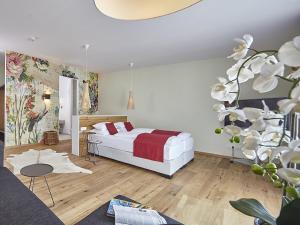 Postel nebo postele na pokoji v ubytování Hotel Kapellenberg + 30 fotografií