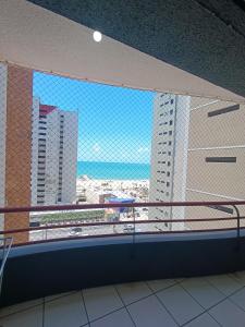 a view of the city from a balcony at Porto de Iracema Vista Mar in Fortaleza