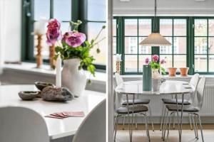 a dining room with a white table with chairs and flowers at 722-Thyboron-Vesterhavsgade-144 in Thyborøn +14 photos