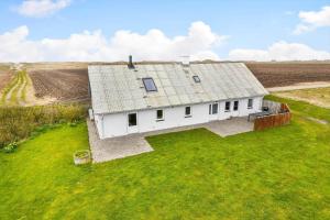 an aerial view of a white house in a field at 526-Lemvig-Rubyvej-21 in Lemvig