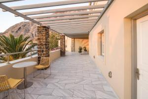 A balcony or terrace at Antinea Suites Hotel & Spa