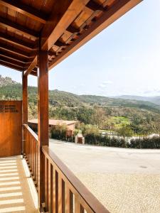 a balcony with a view of a parking lot at Retiro do Gerês in Geres