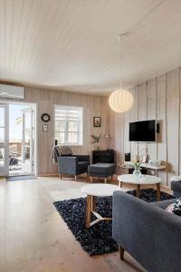 a living room with a couch and a table at 0421-Romo-Vestergade-3-Ap-34 in Høm
