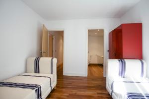 Łóżko lub łóżka w pokoju w obiekcie Alderdi Eder by People Rentals