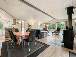 a large living room with a table and chairs at 0240-Romo-Peder-Jespersensvej-9 in Høm