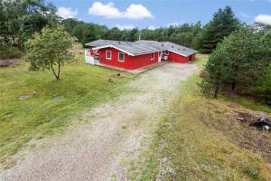 an aerial view of a red house in a field at 0240-Romo-Peder-Jespersensvej-9 in Høm
