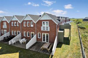 an aerial view of a large brick building with a deck at 0432-Romo-Vestergade-225-App-7 in Høm