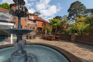a fountain in the yard of a house at Hamble House in Southampton
