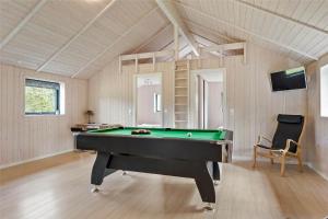 a billiard room with a pool table in it at 0340-Romo-Dvaergternen-2 in Høm