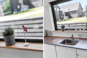 a kitchen counter with a sink and a window at 0433-Romo-Vestergade-345 in Høm +23 photos