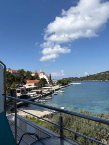 a view of the water with boats in a harbor at Guesthouse Kamarin in Pomena