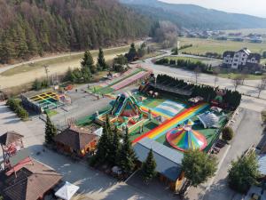 an aerial view of a water park with a roller coaster at Apartmány Humno in Stará Turá