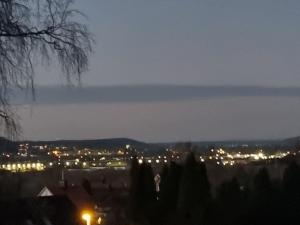 a view of a city at night with lights at Haby House Old in Skene