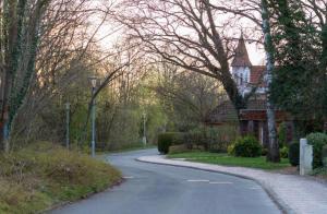 a winding road with a house and a house at RosaVilla in Wilhelmshaven