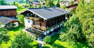 an aerial view of a house with a roof at Apartment Morgensonne in Piesendorf