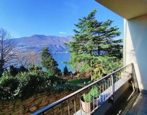 a balcony with a view of a lake at Kaspers home lake Como in Blevio