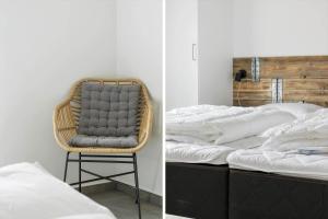 a wicker chair sitting next to a bed at 0364-Romo-Vestergardsvaenget-7 in Høm