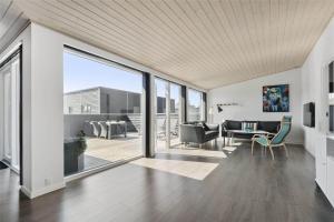 a living room with a view of a patio at 0323-Romo-Vestergade-359 in Høm