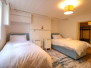 a room with two beds in a room at 7 Athol Terrace in Dover