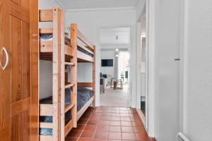 a hallway with bunk beds in a room at 0459-Romo-Vestergade-237-App-64 in Høm +29 photos