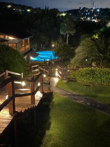 a view of a swimming pool at night at Sole Luna in Río Ceballos