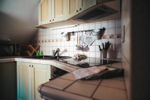 a kitchen with a sink and a counter top at C'era Una Volta in Monopoli