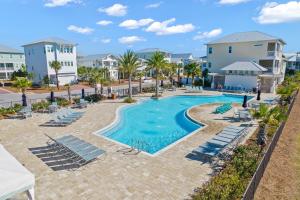 an image of a swimming pool at a resort at Isle be 'SEA'ing You in Inlet Beach